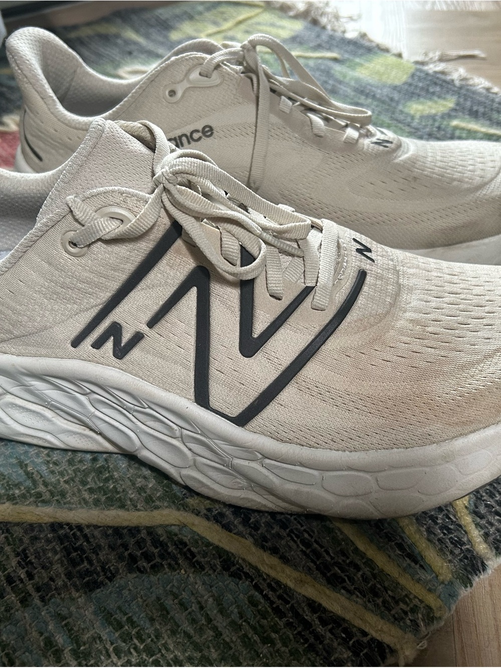 New Balance Men's Athletic Sneakers in Cream with Black Accents